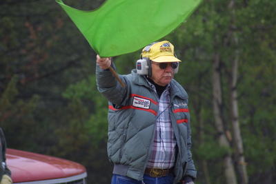 Race Worker with Start Flag