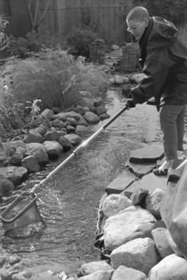 mom cleaning the pond.jpg